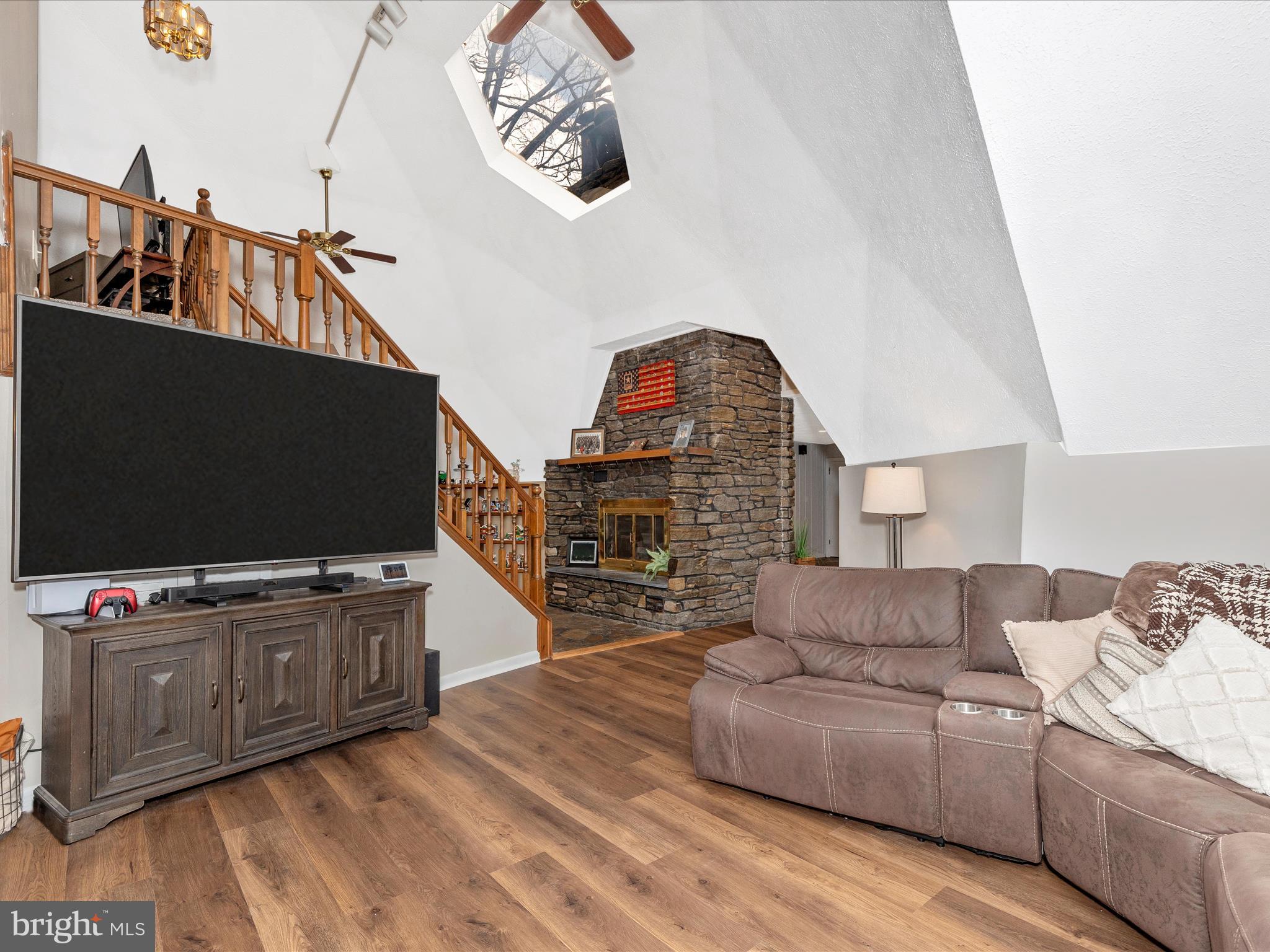111 Bachmans Valley Road Westminster, MD 21158 - Photo 17 of 97 a living room with furniture and a flat screen tv