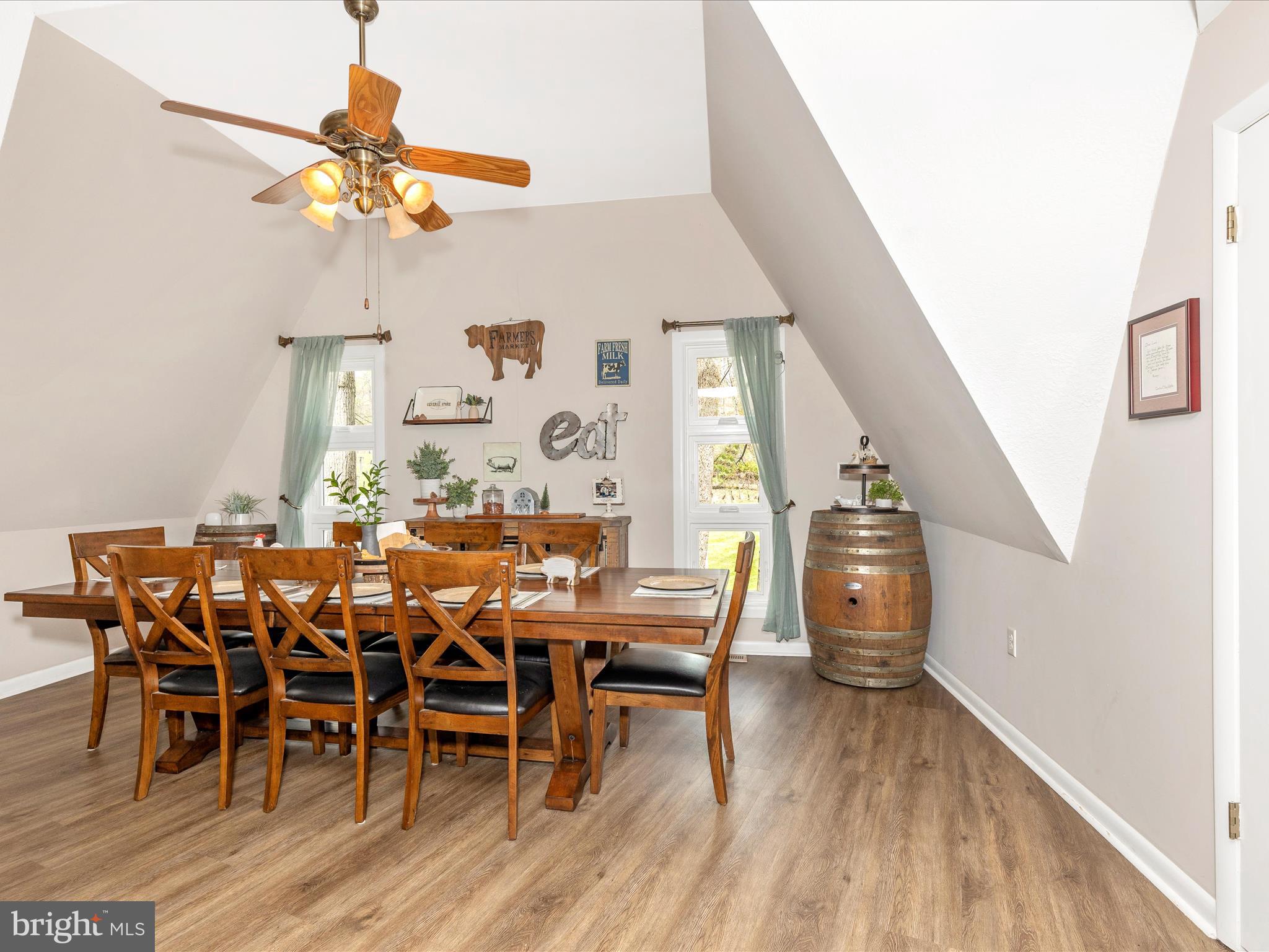 111 Bachmans Valley Road Westminster, MD 21158 - Photo 25 of 97 a view of a dining room with furniture and wooden floor