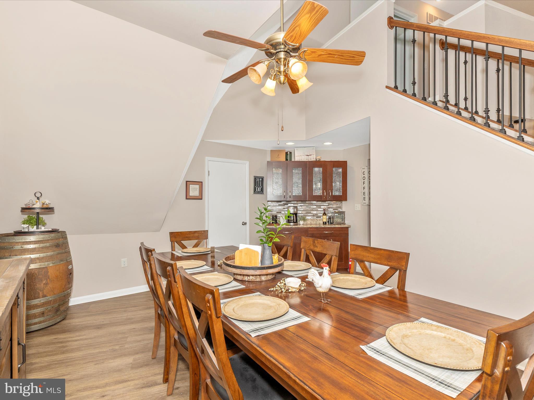 111 Bachmans Valley Road Westminster, MD 21158 - Photo 26 of 97 a view of a dining room with furniture and wooden floor