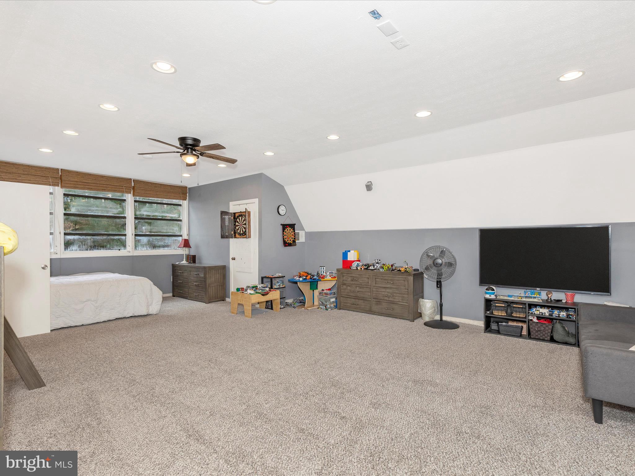 111 Bachmans Valley Road Westminster, MD 21158 - Photo 44 of 97 a view of a livingroom with furniture and a flat screen tv