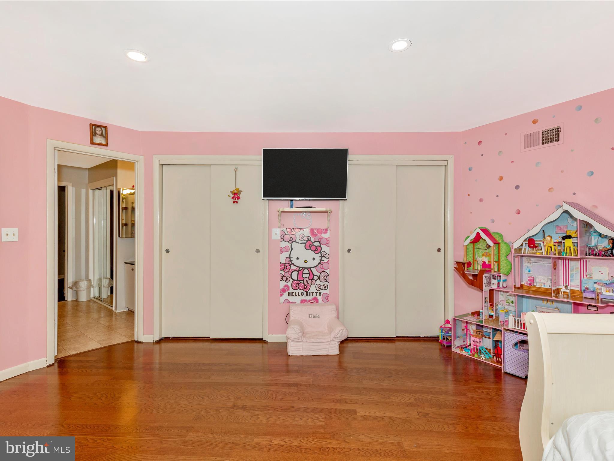 111 Bachmans Valley Road Westminster, MD 21158 - Photo 52 of 97 wooden floor with furniture and flat screen tv
