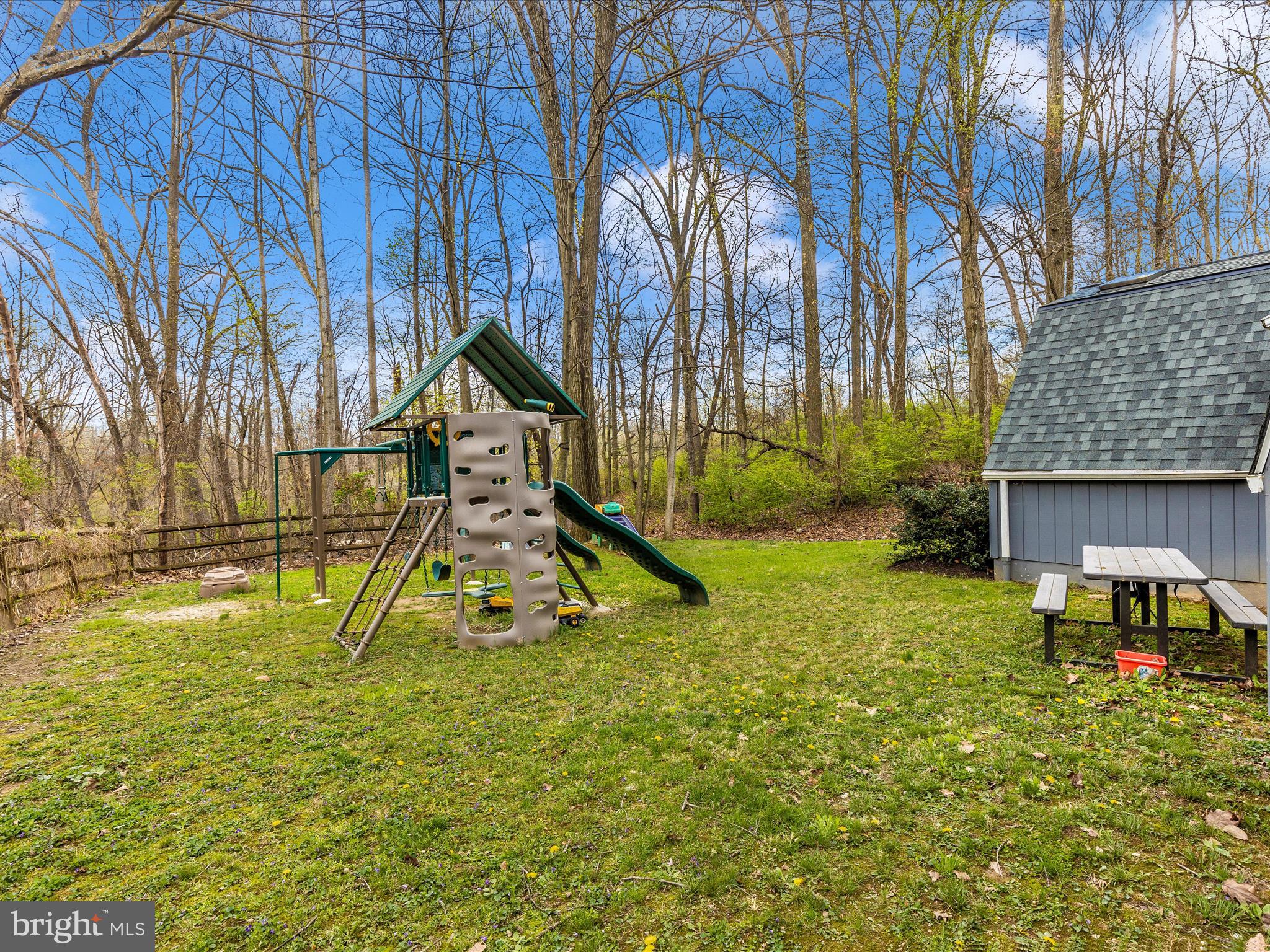 111 Bachmans Valley Road Westminster, MD 21158 - Photo 68 of 97 a view of playground with a slide and swing