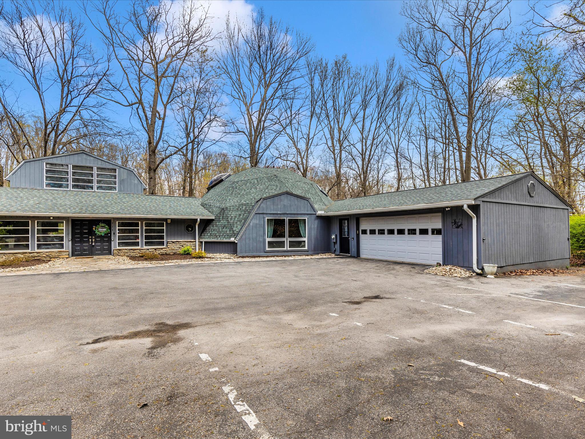 111 Bachmans Valley Road Westminster, MD 21158 - Photo 73 of 97 a front view of a house with a dirt yard and a large tree