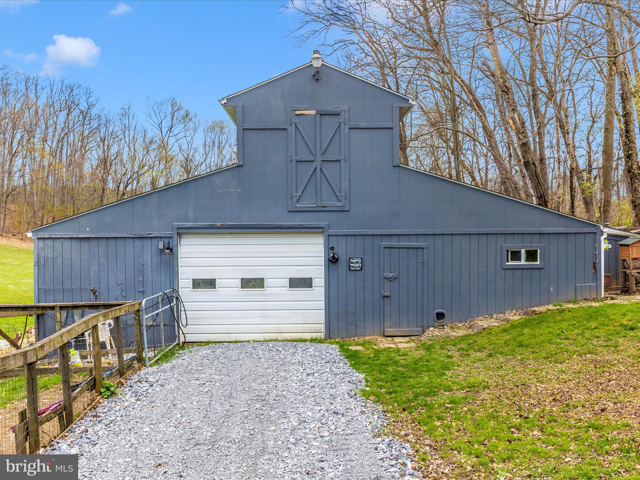 111 Bachmans Valley Road Westminster, MD 21158 - Photo 83 of 97 a front view of a house with a yard and garage