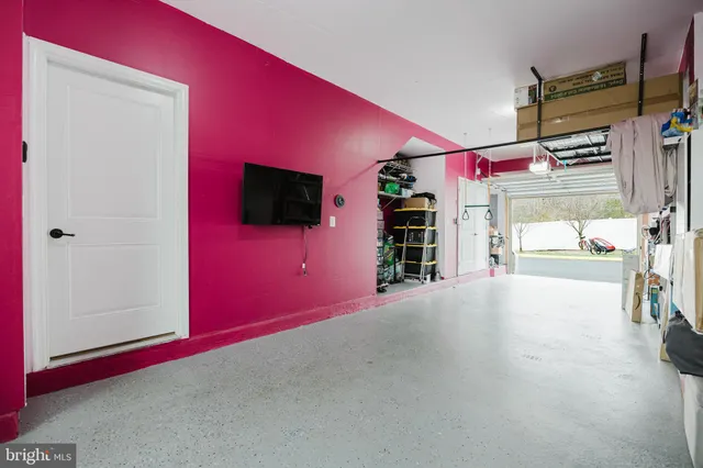 a kitchen with stainless steel appliances granite countertop a stove and a refrigerator