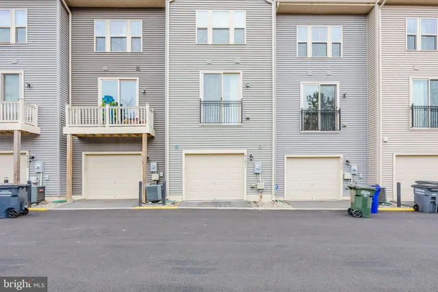 a view of a street with a building