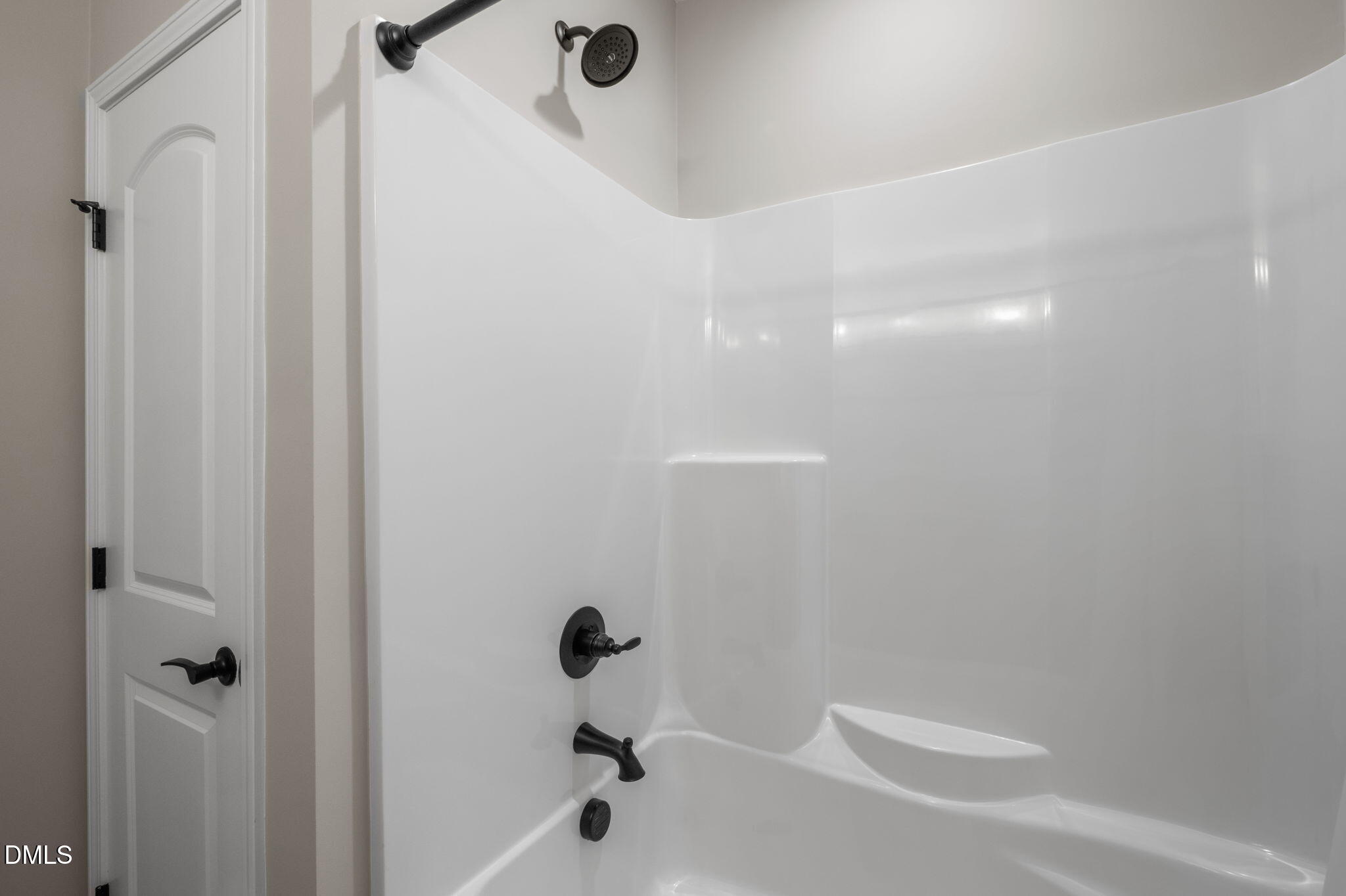 8514 Charlie Stovall Road Roxboro, NC 27574 - Photo 27 of 48 a bathroom with a bathtub and shower