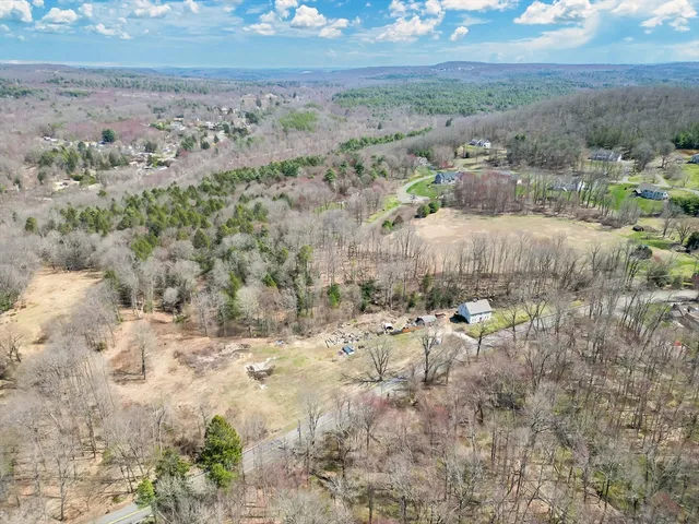 a view of a beach with a mountain view