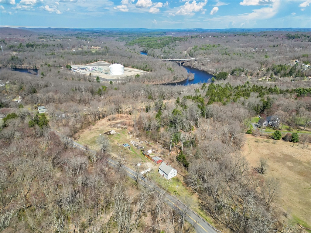 182 Mountain Road Wilbraham, MA 01095 - Photo 6 of 10 a view of a dry yard with lots of trees