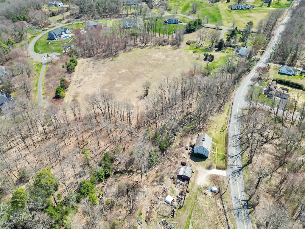182 Mountain Road Wilbraham, MA 01095 - Photo 8 of 10 a view of a yard with plants