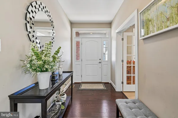 a view of entryway with wooden floor