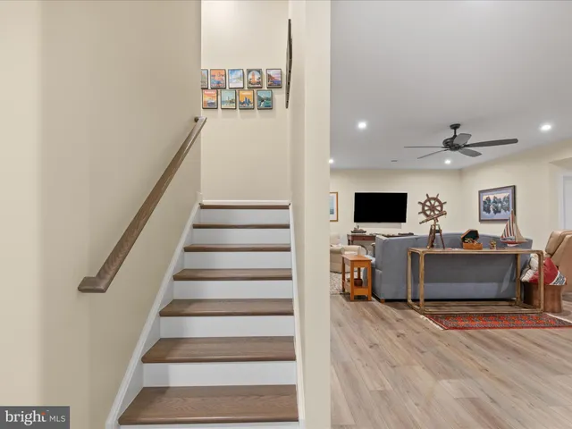 an aerial view of residential house with outdoor space and parking