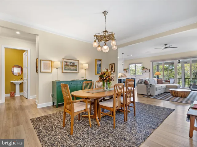 a living room with furniture fireplace and flat screen tv