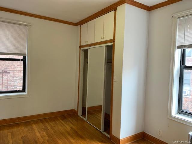 43-33 48th Street, Unit 1A Queens, NY 11104 - Photo 12 of 14 a view of an entryway with wooden floor