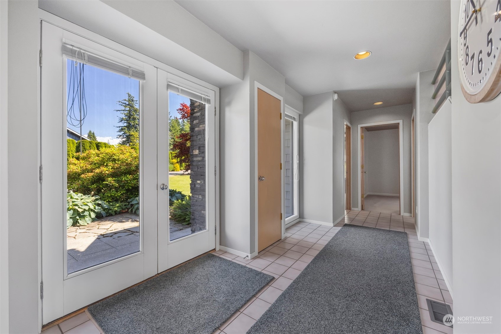 720 Van Dyk Road Lynden, WA 98264 - Photo 25 of 39 a view of a hallway with wooden floor and a window
