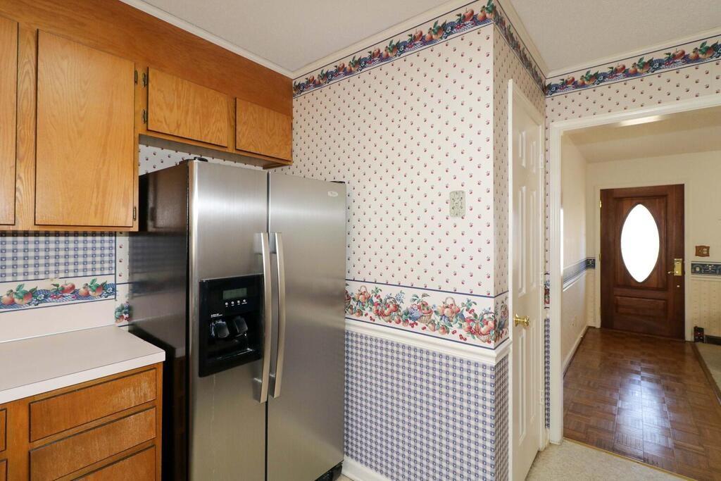 2245 Barger Road Salisbury, NC 28146 - Photo 14 of 48 a kitchen with a refrigerator and a stove