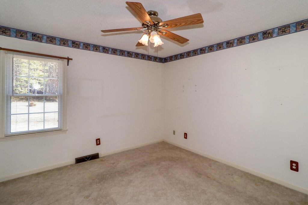 2245 Barger Road Salisbury, NC 28146 - Photo 17 of 48 a view of a room with window and a ceiling fan