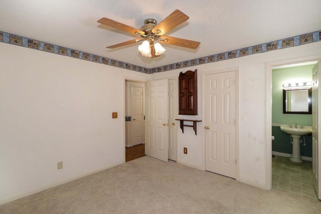 2245 Barger Road Salisbury, NC 28146 - Photo 18 of 48 a view of a chandelier fan and a hallway