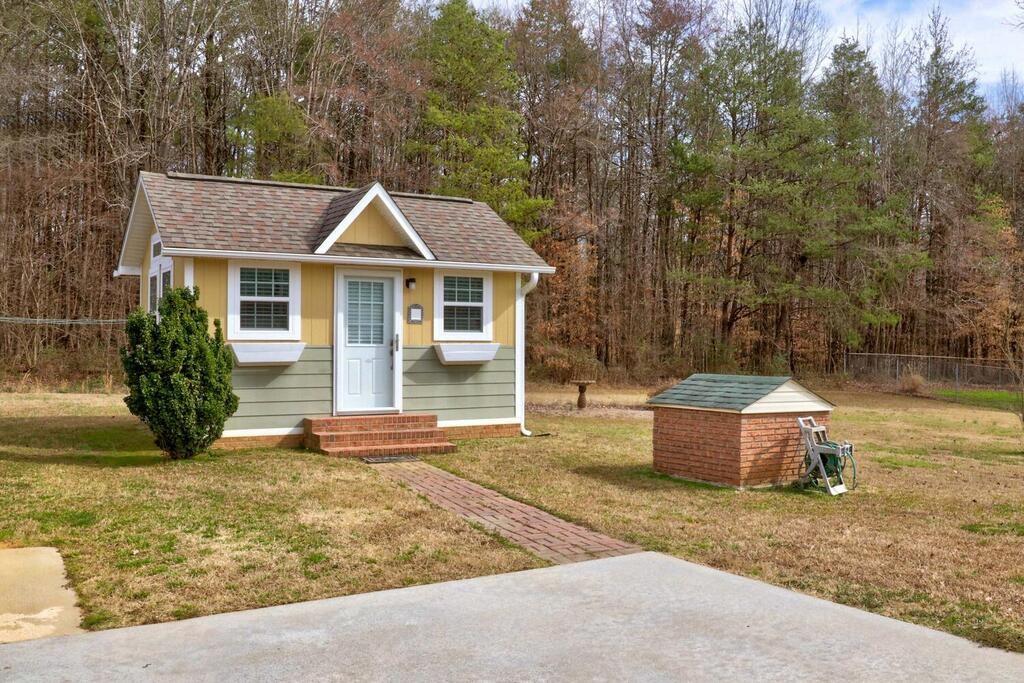 2245 Barger Road Salisbury, NC 28146 - Photo 37 of 48 a front view of a house with a yard and garage