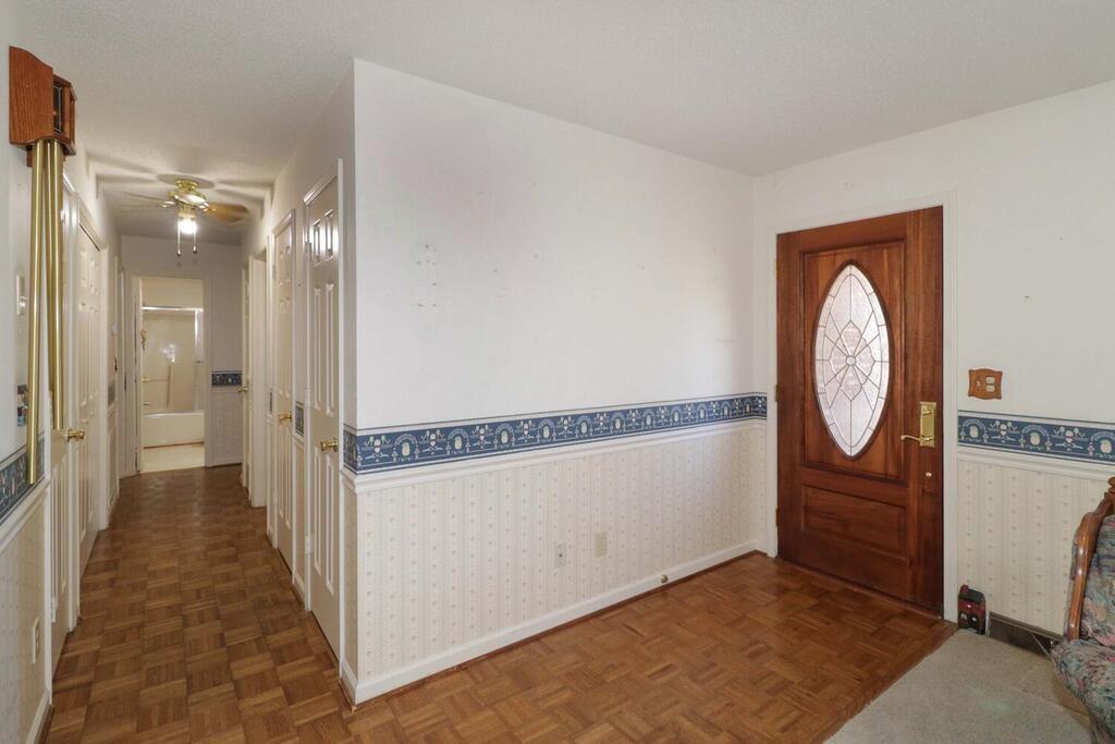 2245 Barger Road Salisbury, NC 28146 - Photo 7 of 48 a view of a hallway with wooden floor and entryway