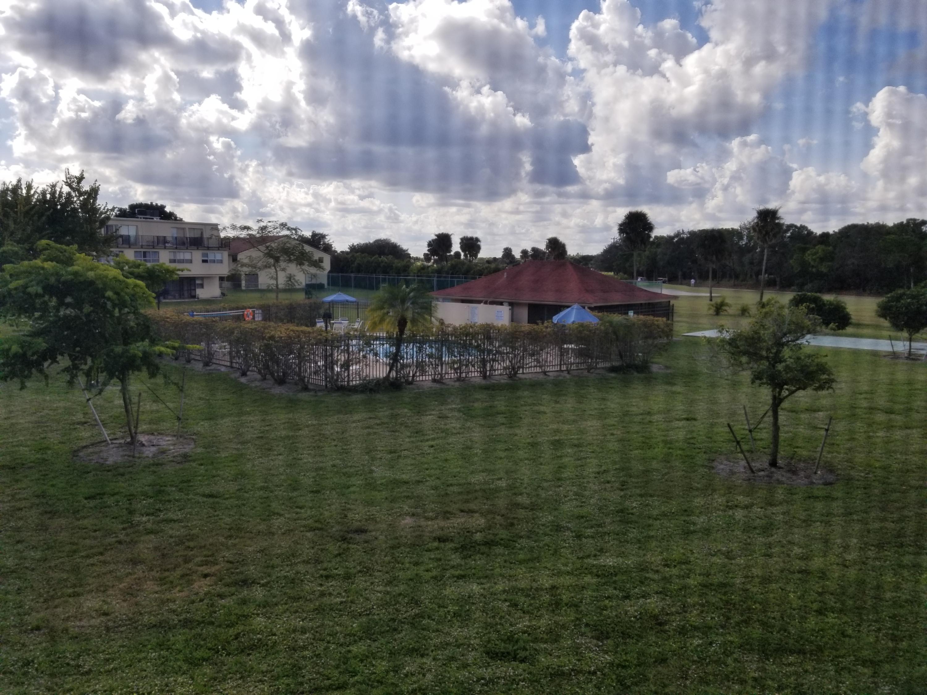 9500 Southwest 3rd Street, Unit A221 Boca Raton, FL 33428 - Photo 31 of 34 View Through a Screened in View