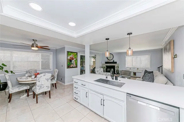 a dining room with furniture and a book shelf