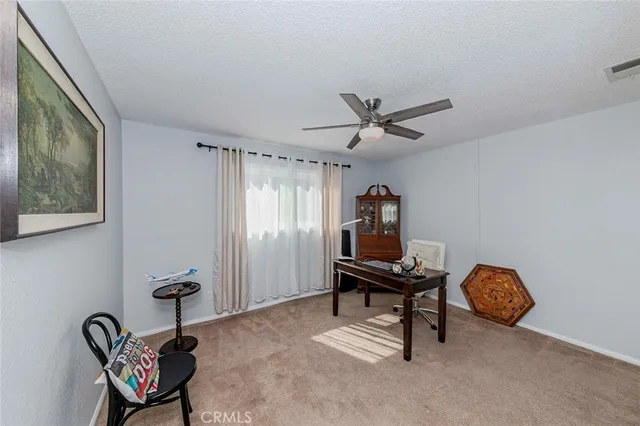 a view of entryway and hall with a front door