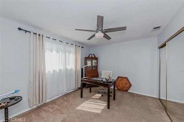 a view of a hallway with white walls