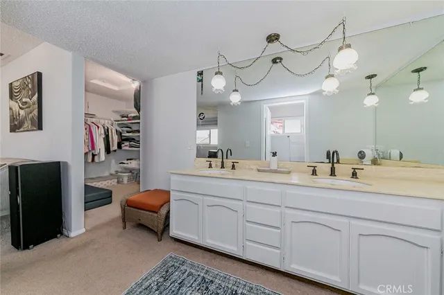 a view of a balcony with furniture