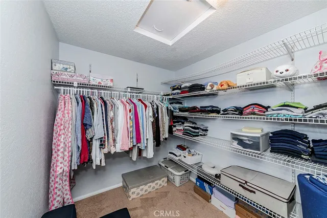 a view of a balcony with chair and table