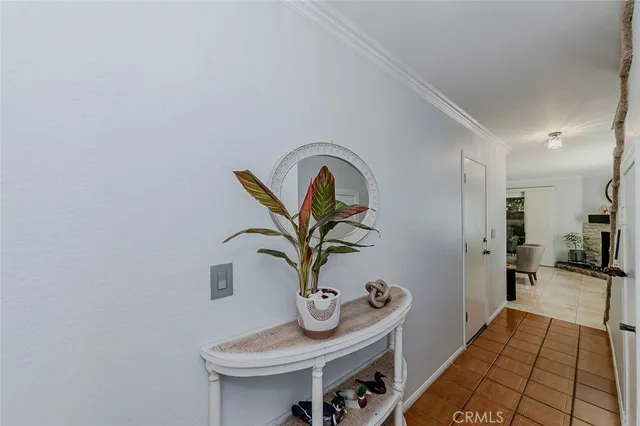 a living room with furniture a couch and a table