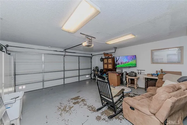 a view of an chairs and tables in the patio