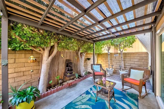 a view of a porch with seating space