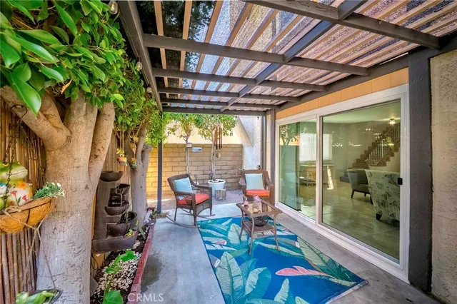 a swimming pool with yard and balcony