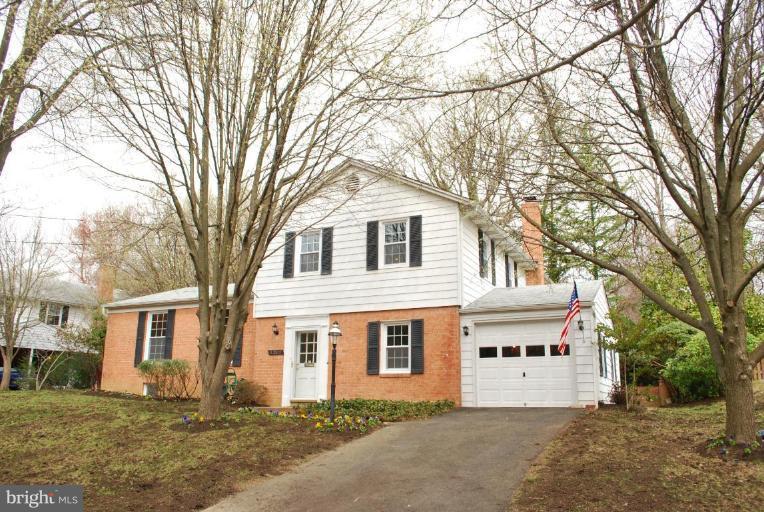 4205 Sleepy Hollow Road Annandale, VA 22003 - Photo 1 of 14 a front view of a house with a yard