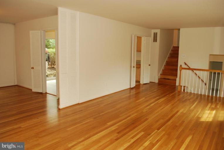 4205 Sleepy Hollow Road Annandale, VA 22003 - Photo 12 of 14 a view of a room with wooden floor and stairs