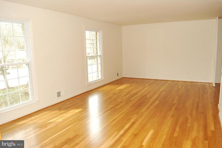 4205 Sleepy Hollow Road Annandale, VA 22003 - Photo 14 of 14 a view of empty room with wooden floor and fan