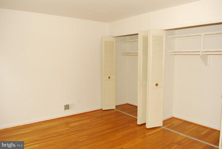 4205 Sleepy Hollow Road Annandale, VA 22003 - Photo 5 of 14 a view of empty room with wooden floor
