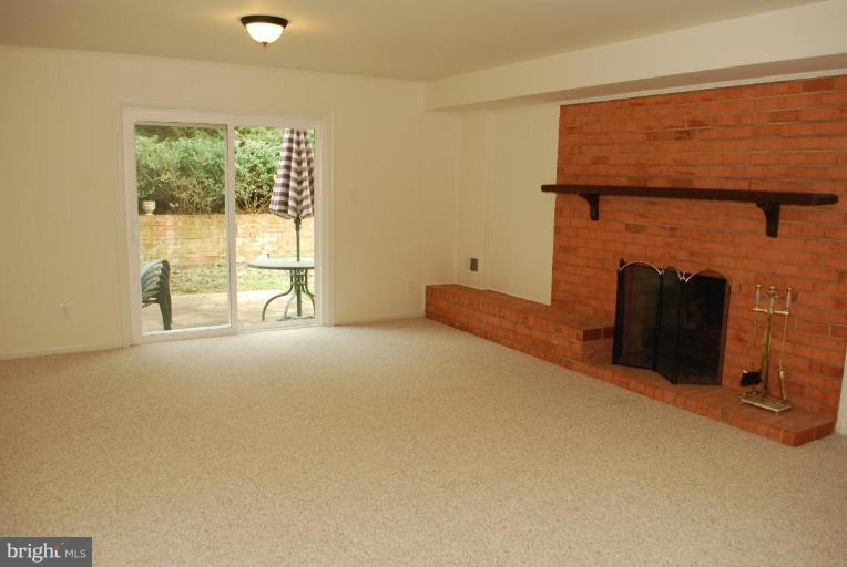 4205 Sleepy Hollow Road Annandale, VA 22003 - Photo 8 of 14 a view of an empty room with a fireplace