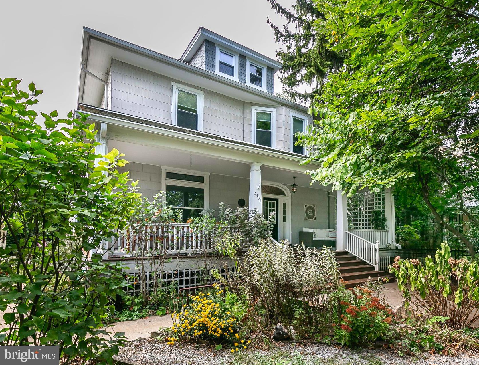 5506 Rusk Avenue Baltimore, MD 21215 - Photo 2 of 54 Front of home, lush foliage