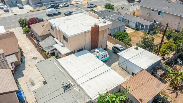 an aerial view of a house with outdoor space