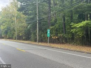 a view of a glass door with a street