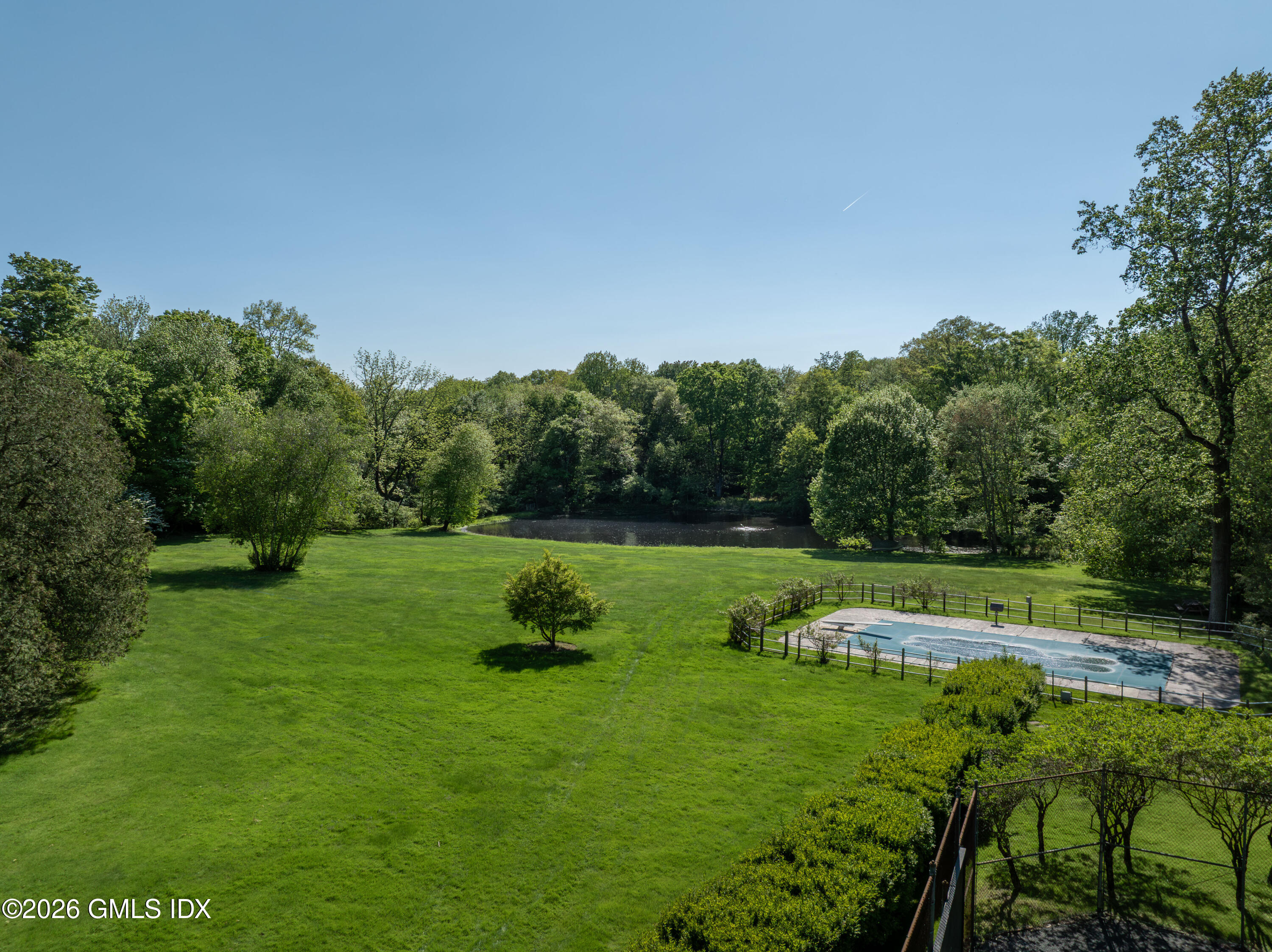 122 Round Hill Road Greenwich, CT 06831 - Photo 21 of 37 a view of a park with large trees