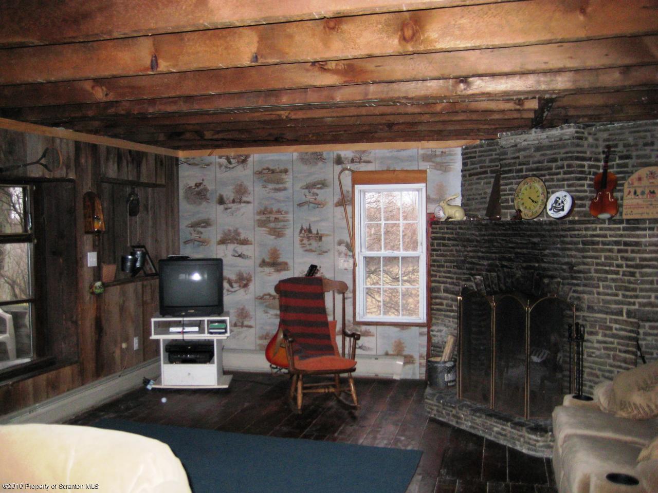 Rr2 Rr2 Ulster, PA 18850 - Photo 5 of 12 a living room with furniture and a fireplace
