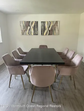 a table and chairs in a blue room
