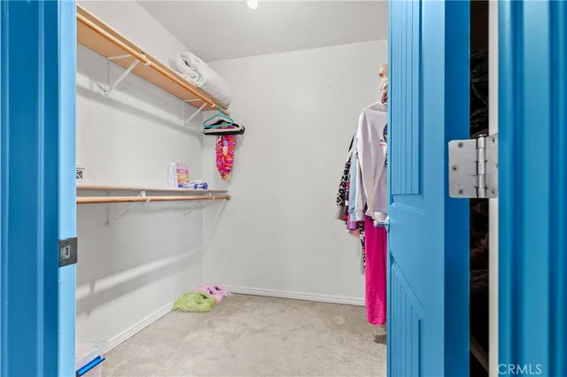 a bathroom with a granite countertop toilet a sink and bathtub