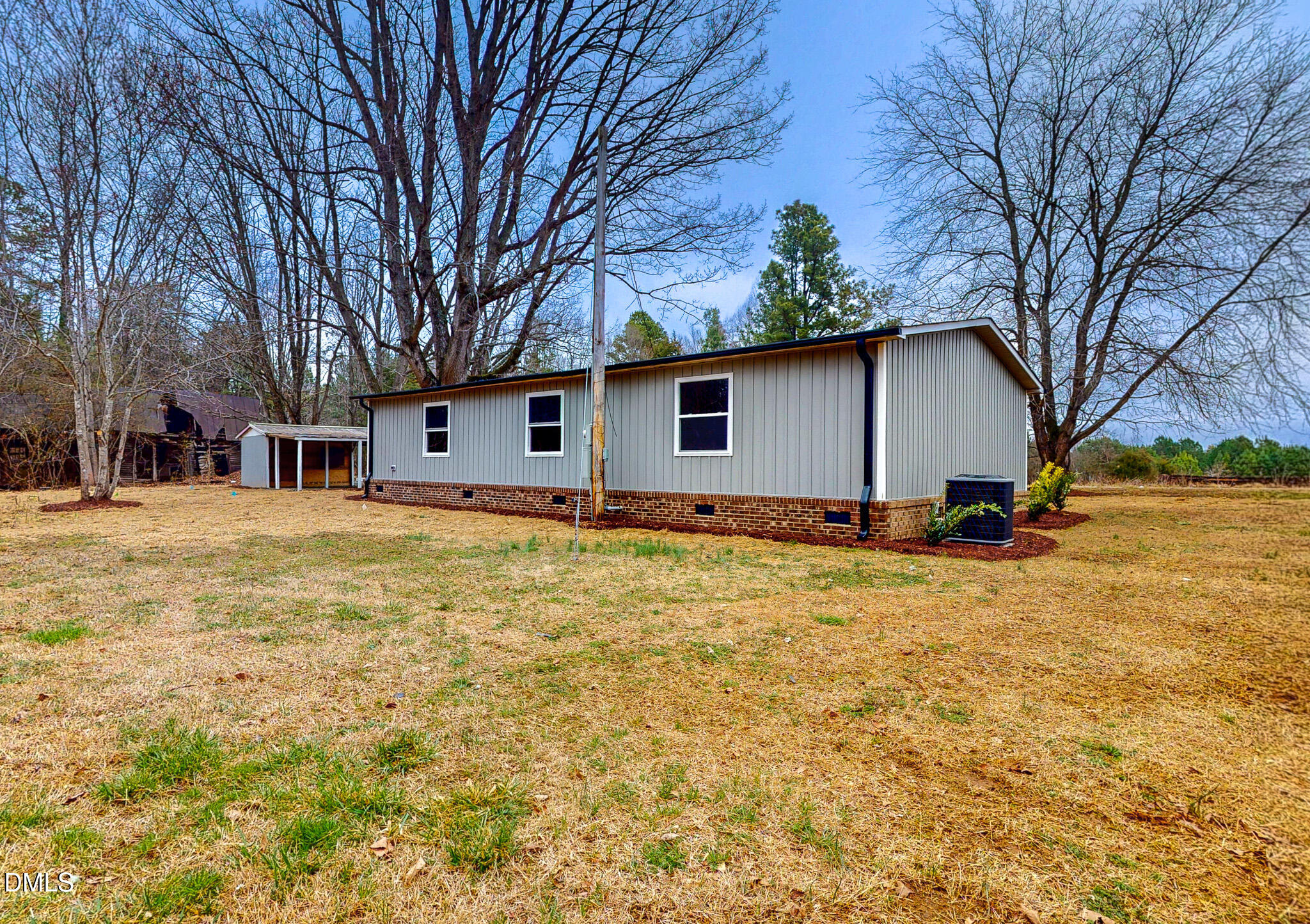 67 Halifax Road Roxboro, NC 27574 - Photo 27 of 48 a house view with backyard space