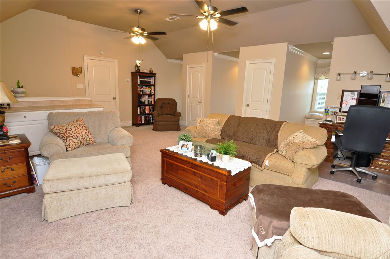 4420 Price Road Moscow, TN 38057 - Photo 22 of 25 Head upstairs and you will find a large bonus room with 2 large closets and window seats.