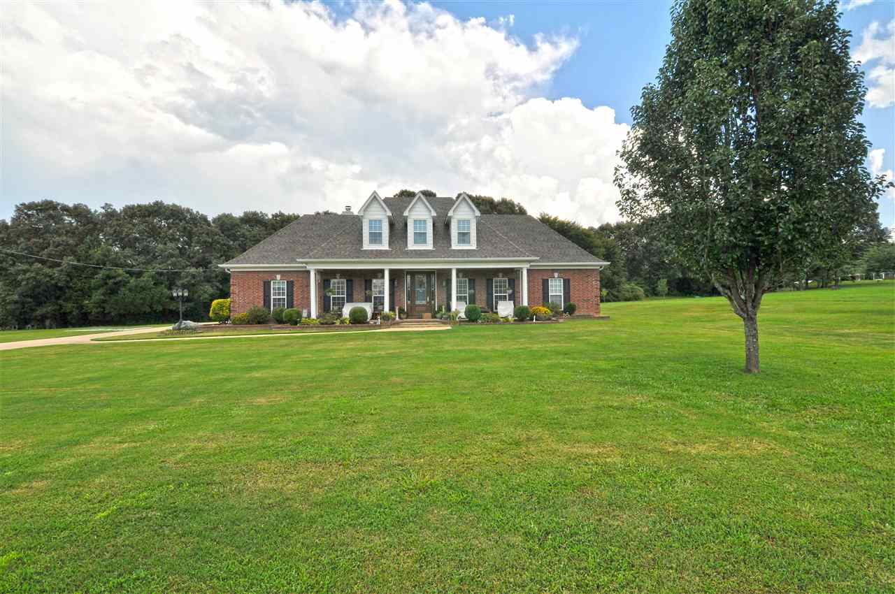 4420 Price Road Moscow, TN 38057 - Photo 5 of 25 This home is nestled on 2.20 acres for the perfect country setting but still convenient to town for shopping and restaurants.