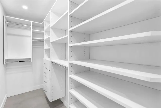 a view of an empty walk in closet